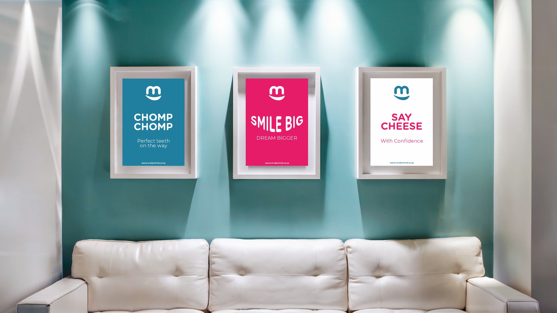 Three McKechnie Dental waiting-room posters reading Chomp Chomp, Smile Big and Say Cheese